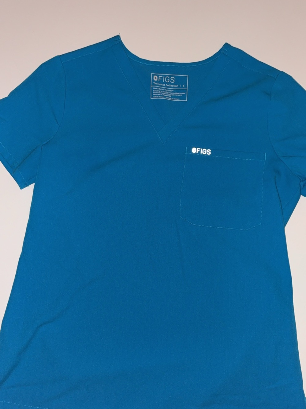 FIGS Short-Sleeve V-Neck Scrub Top in Teal Blue size small, jogger pants XS